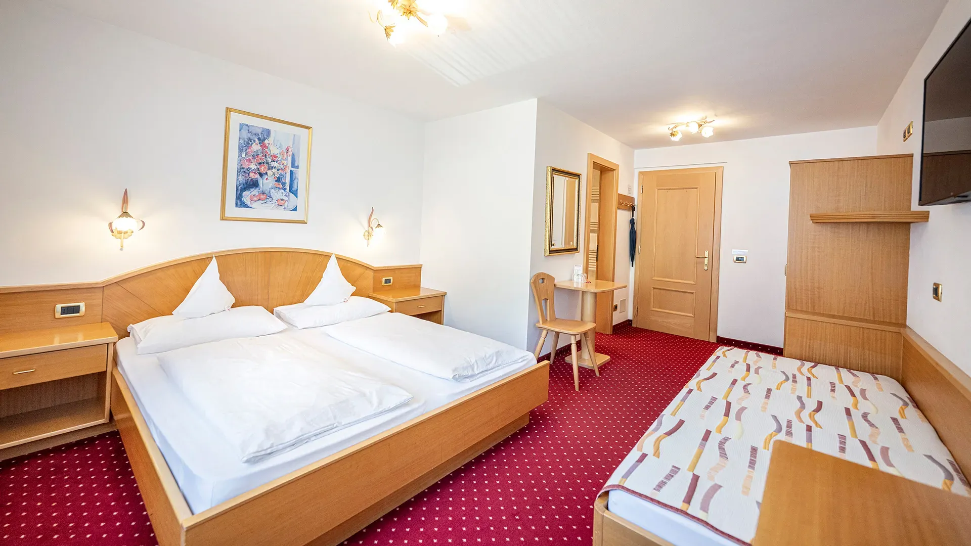 Familien- und Mehrbettzimmer im Garni Crepaz in Wolkenstein in den Dolomiten